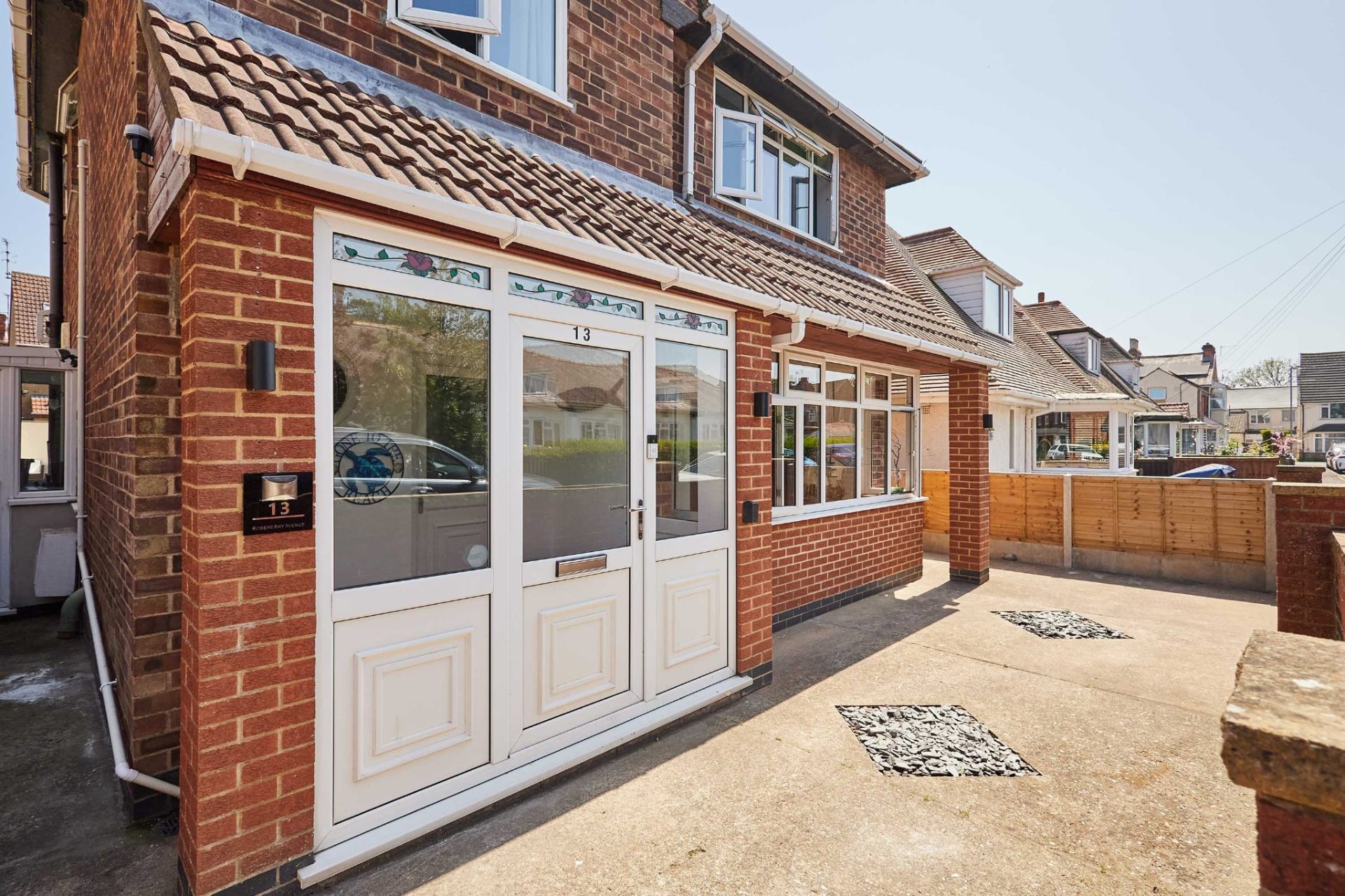 Front porch and stained-glass entrance to Sandcastle House Skegness