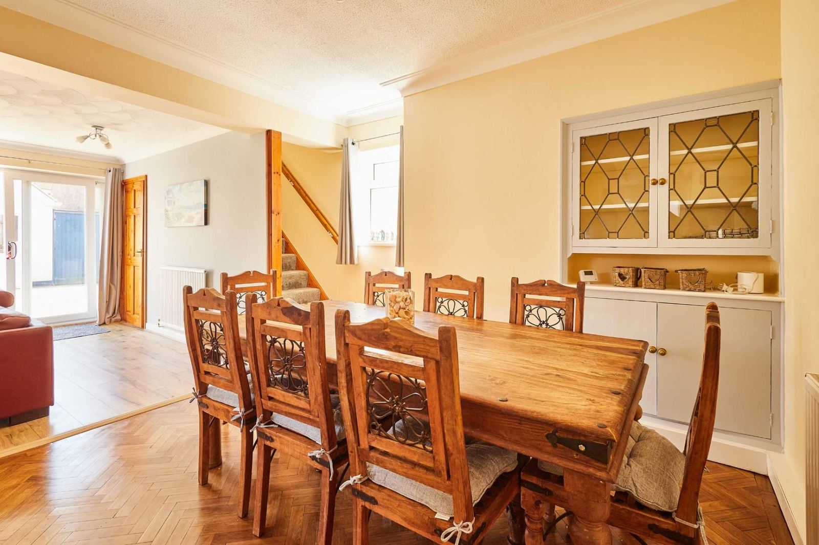 Dining room at Sea Breeze Skegness, set for family meals seating eight