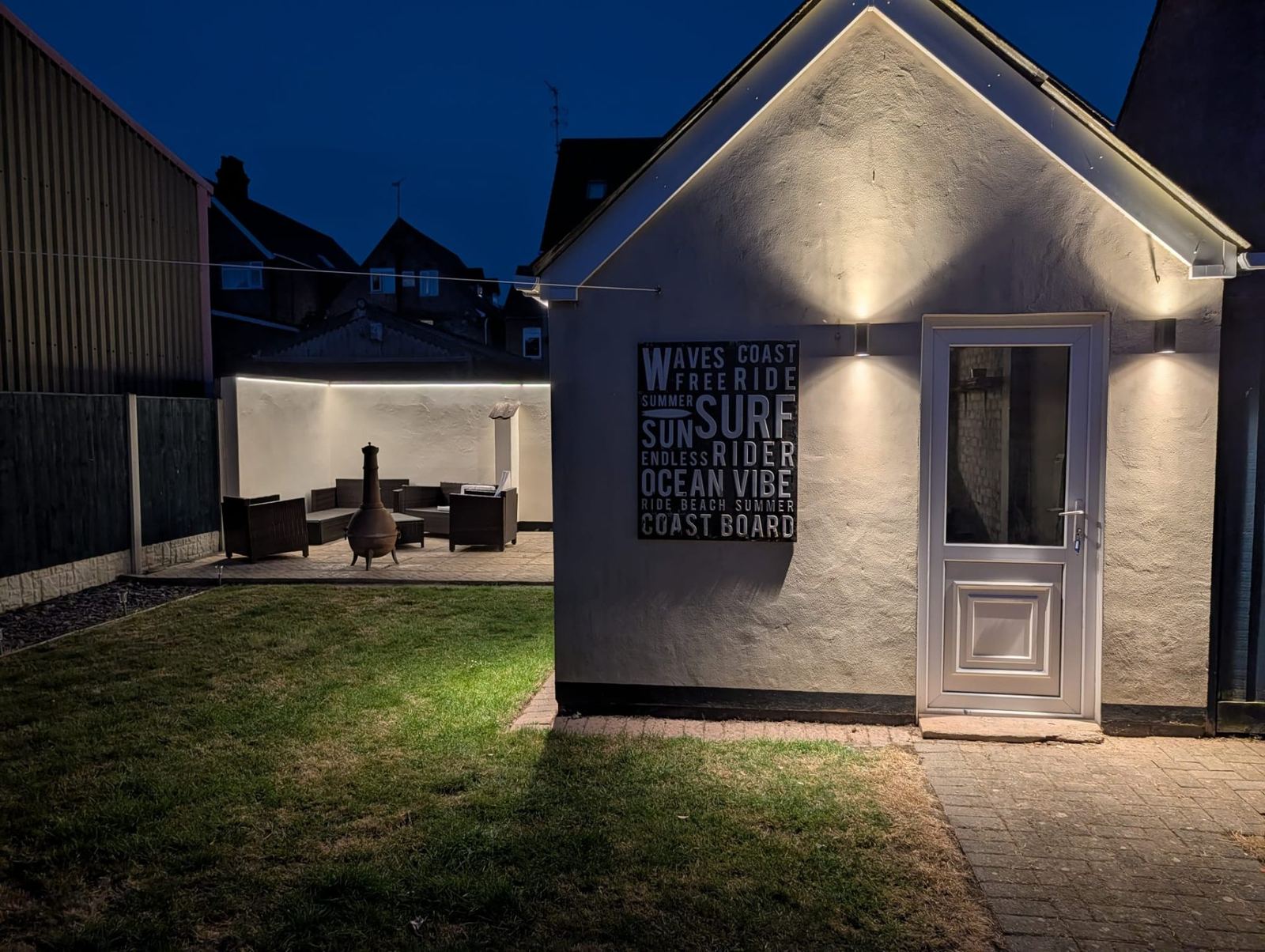 Evening garden with warm lighting at the Sea Breeze holiday home near Skegness Beach